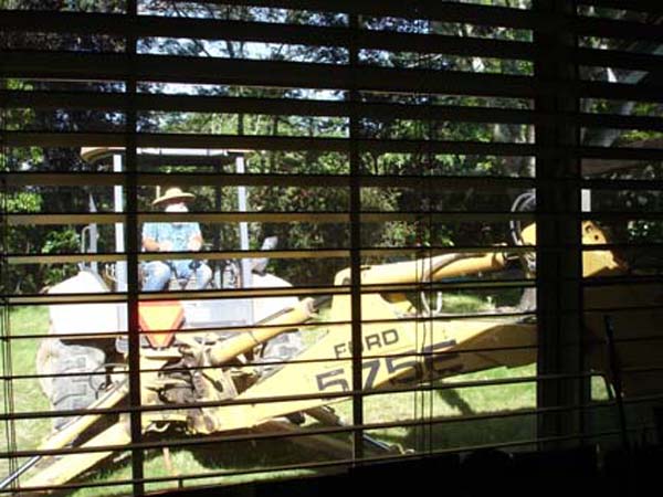 may23-backhoe-out-our-wndw